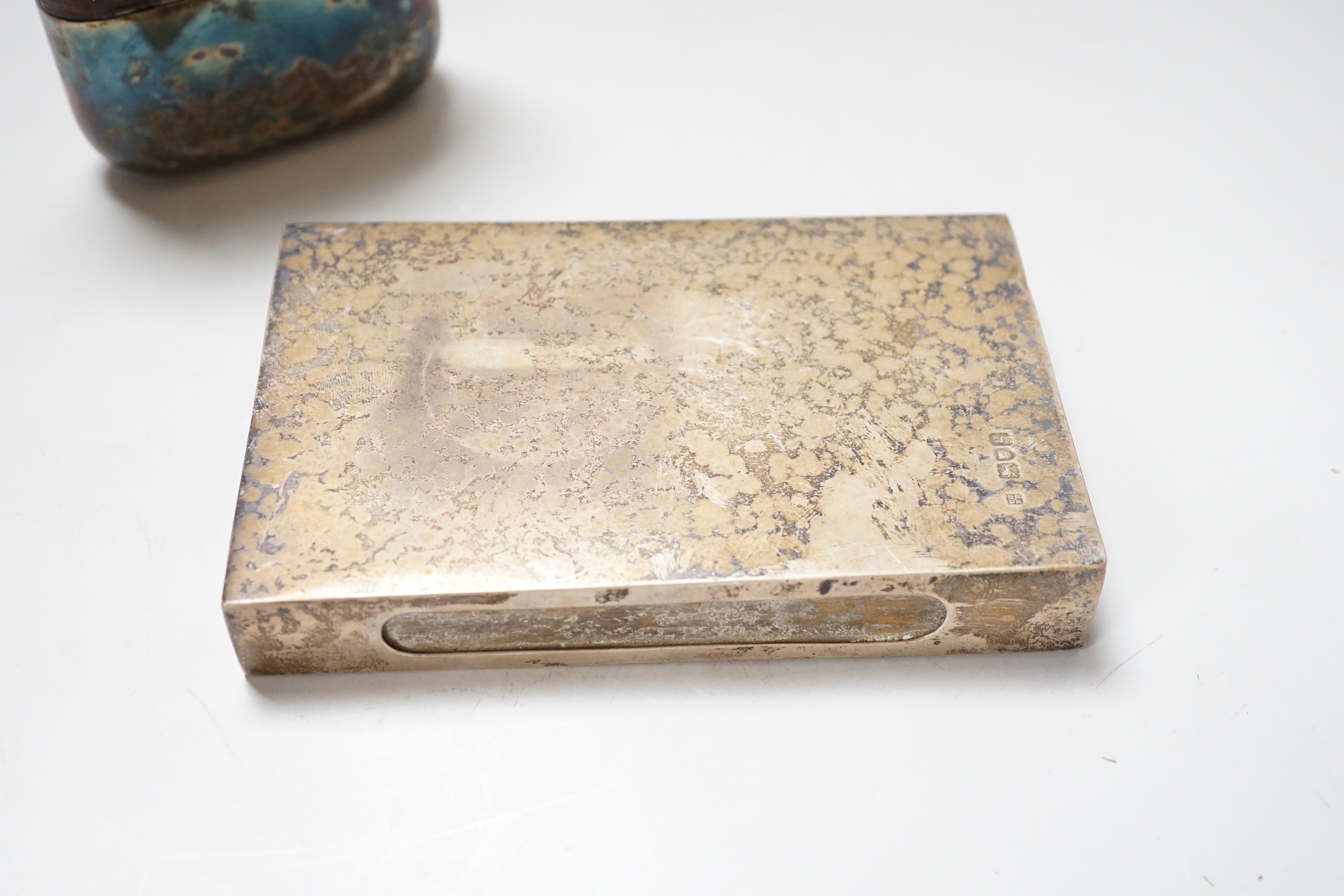 A large George V silver matchbox holder with vintage Swan Vesta's matchbox inside, London 1913, 16cm, net weight 223 grams, and a George V crocodile and glass pocket flask with plated mounts